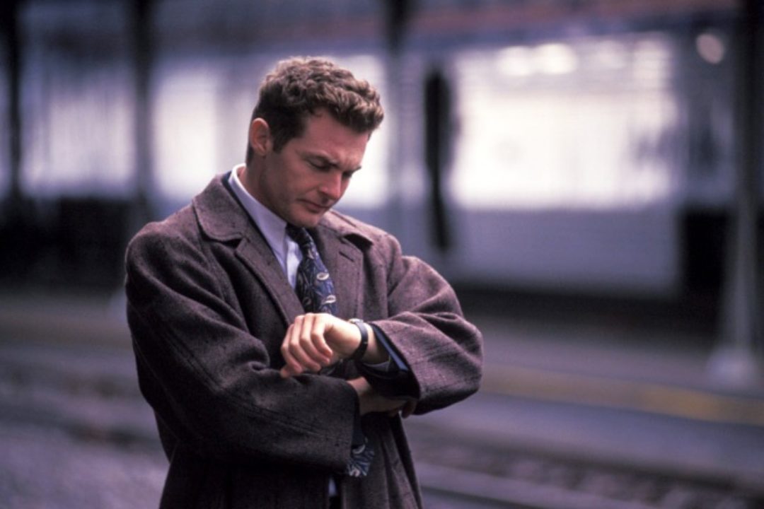 Businessman disappointed at train station